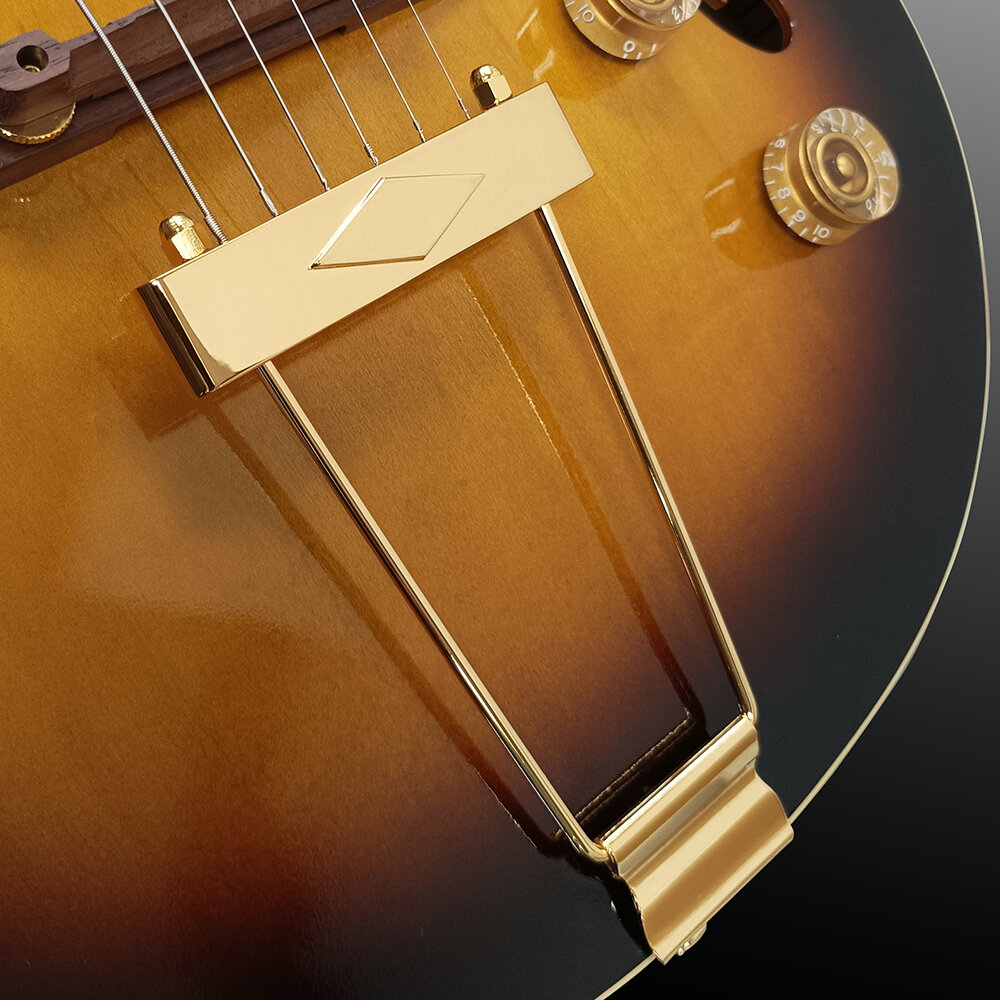 ges-at_tabacco_sunburst_trapeze_tailpiece.jpg